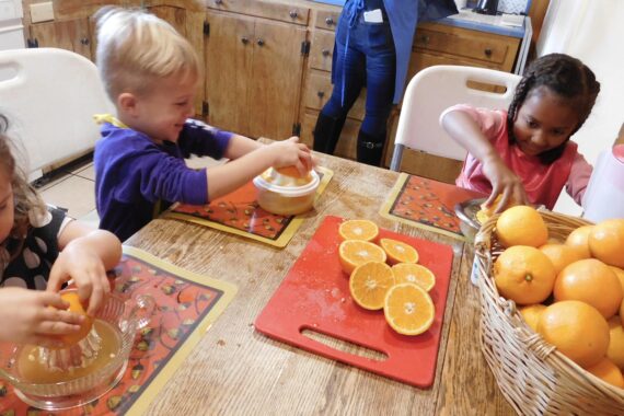 Children preparing food as part of Montessori at home